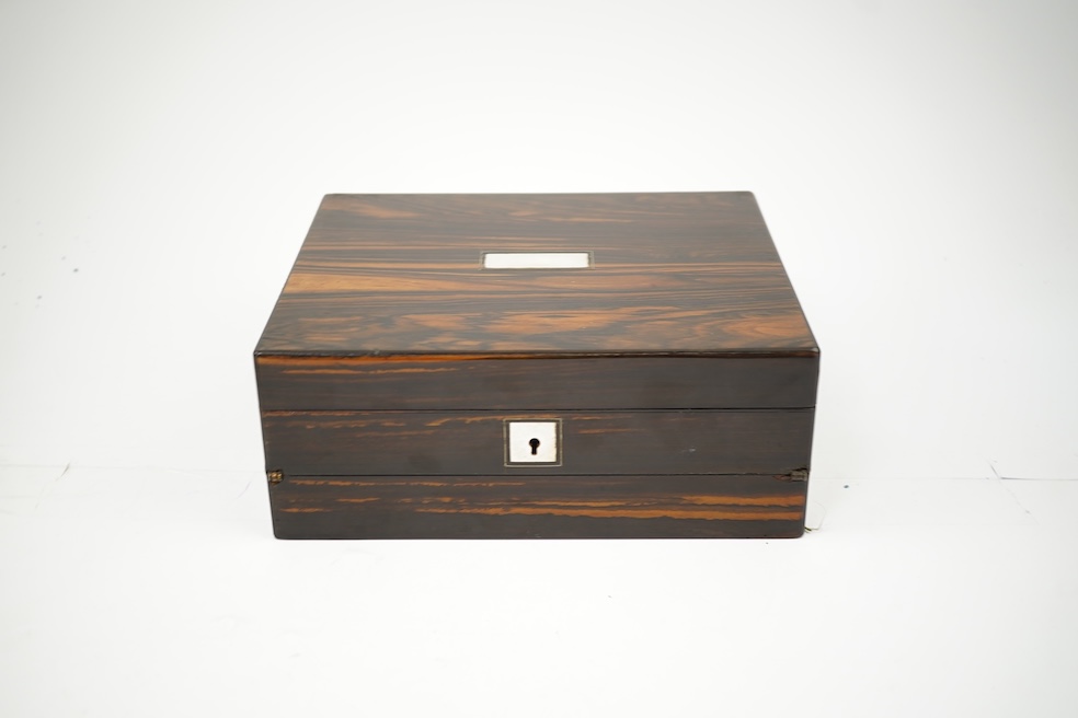 A mid 19th century rosewood writing and sewing box